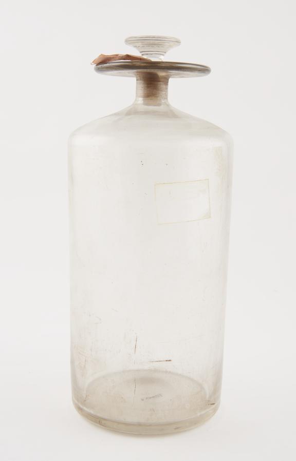 Clear glass storage bottle