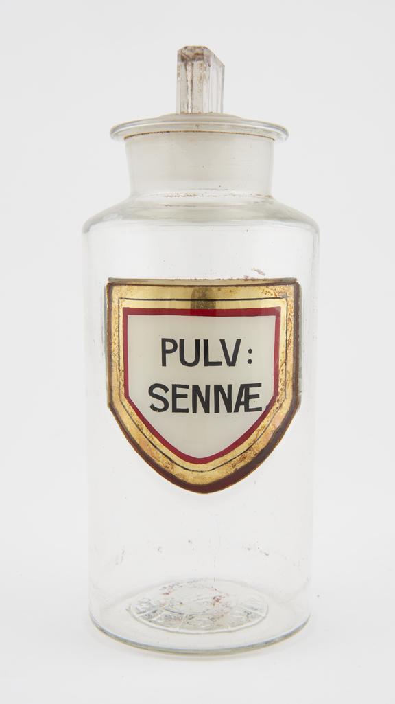 Shop round, glass-fronted label PULV: SENNAE (senna powder)