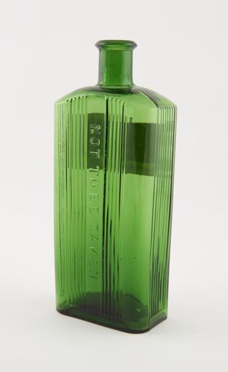 Poison bottle, emerald green glass, labelled