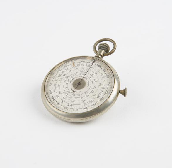 Circular slide rule in pocket watch casae by Scientific