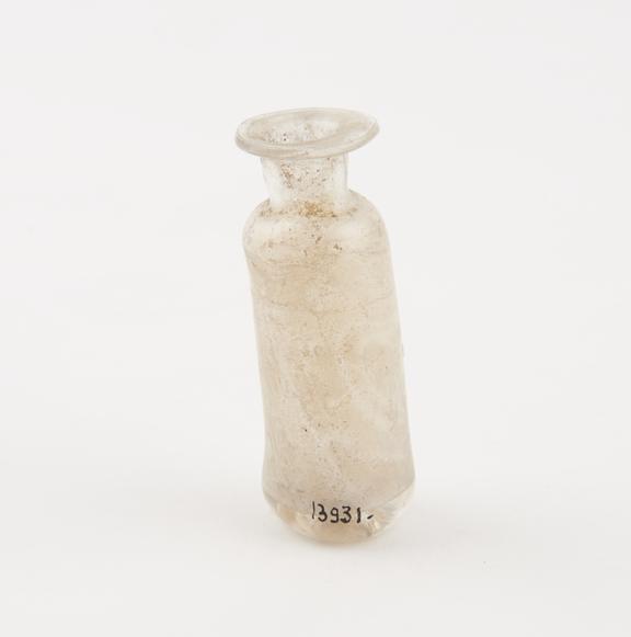 Small clear glass bottle, cylindrical, pontil mark on base