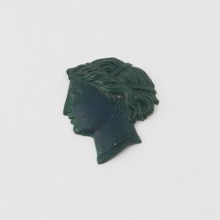 Female head in red Parkesine