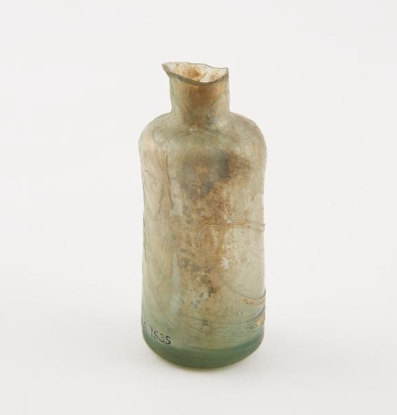 Glass bottle, cylindrical, weathered
