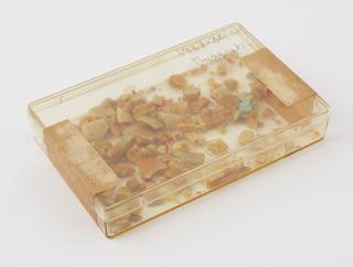 Fragments of red-yellow marbled Parkesine block