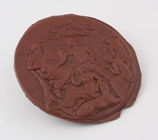 Circular moulded plaque of red Parkesine