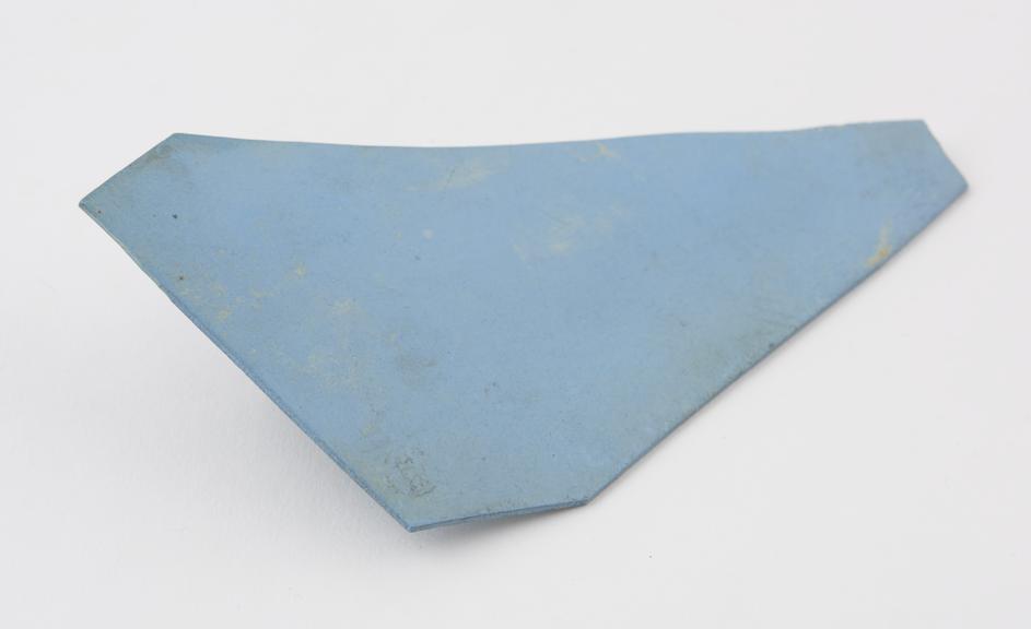 Sample of Parkesine, triangular-shaped off cut, pale blue