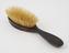 Oval hair brush moulded of imitation tortoiseshell celluloid