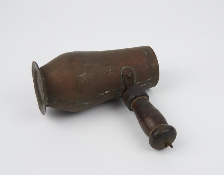 Ladle of copper in form of bulbous vessel