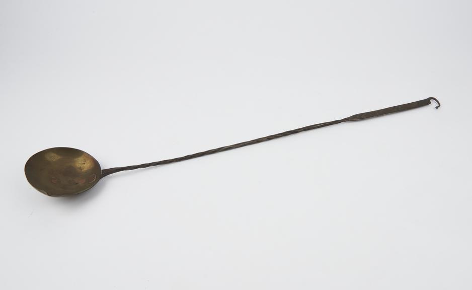 Metal ladle, with lip, twisted stem