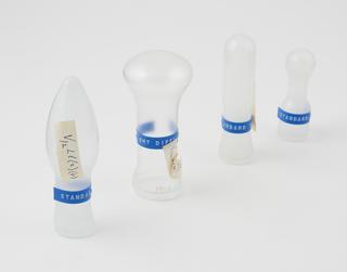 Selection of 4 electric light bulbs showing different kinds of acid etching