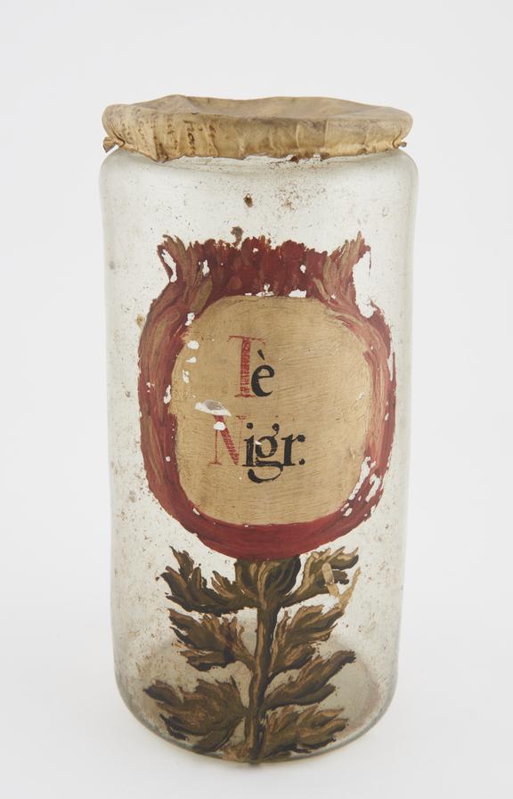 Glass drug jar, with parchment lid, labelled probably Spanish