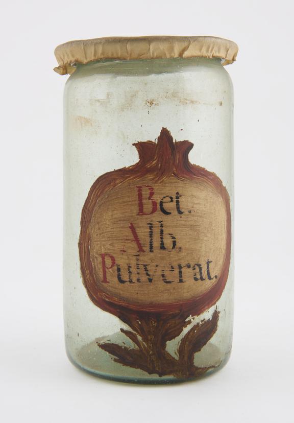 Glass drug jar, with parchment lid, labelled BET.ALB