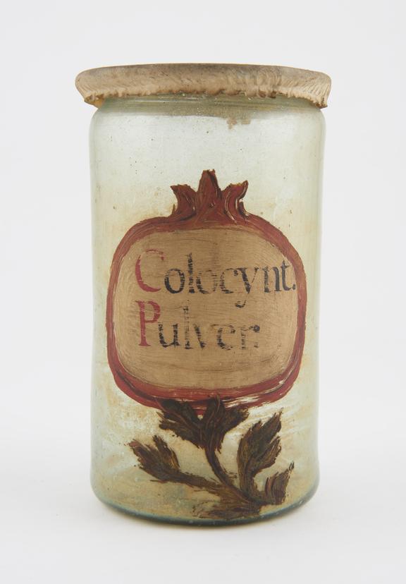 Glass drug jar, cylindrical, with parchment cover