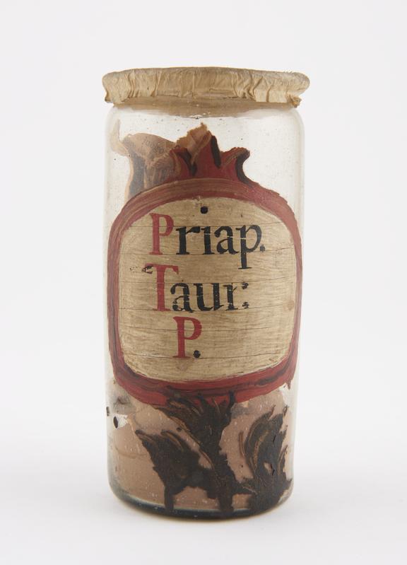 Glass drug jar, cylindrical, with parchment cover