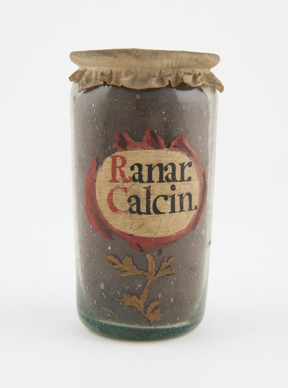 Glass drug jar, with parchment cover