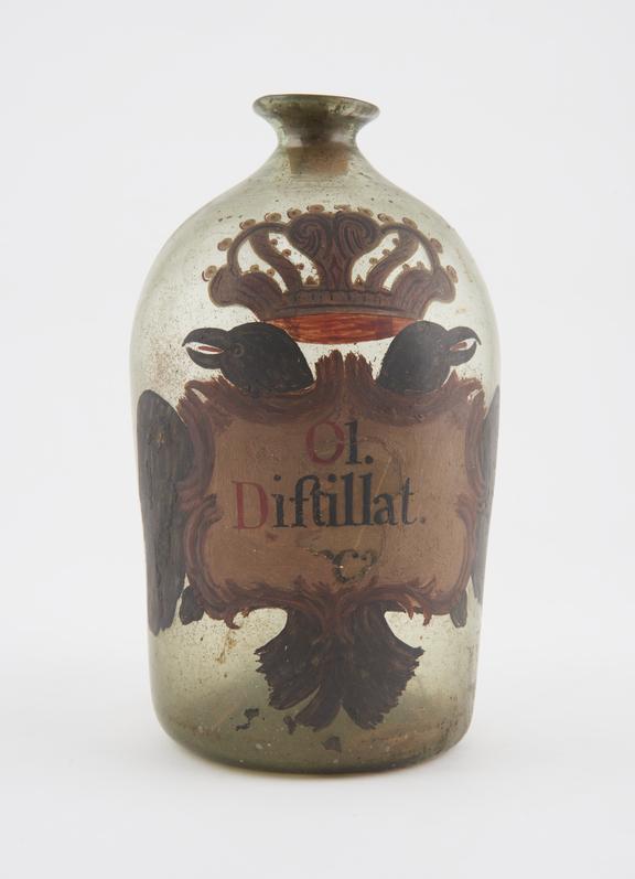 Glass bottle, labelled OL DISTILLAT..