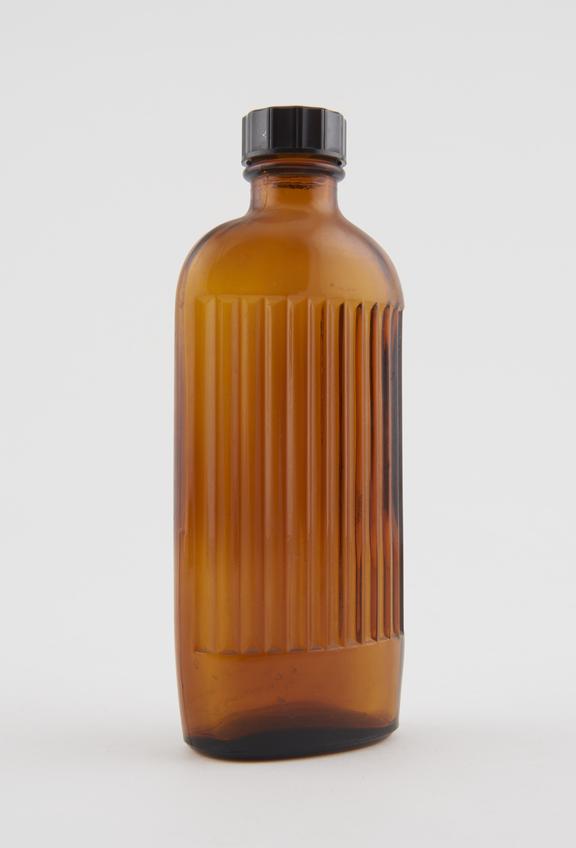 Dispensing bottle, brown glass, unlabelled, plastic top