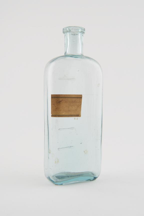 Glass dispensing bottle, with scale, possibly 19th century