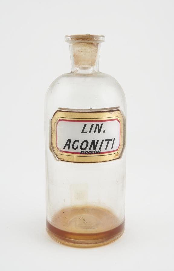 Bottle, clear glass, trace content, for liniment of aconite, U