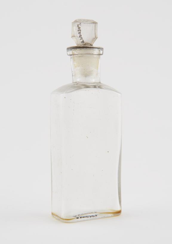 Clear glass dispensing bottle