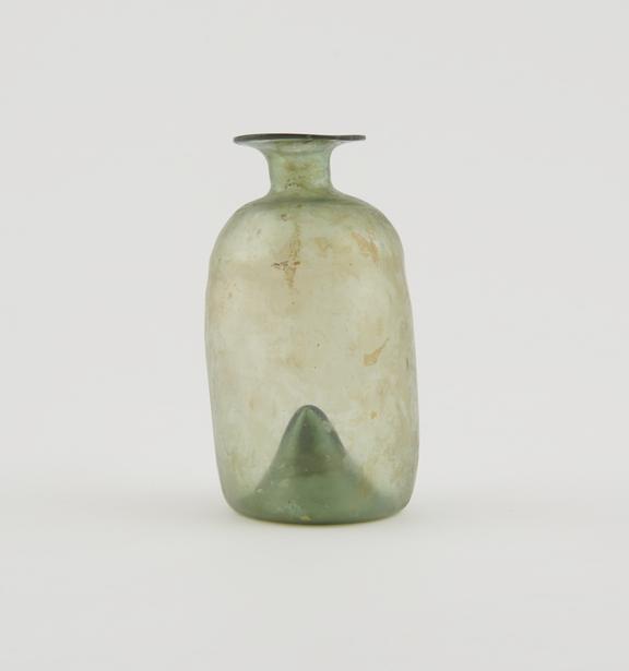 Iridescent green glass bottle, European, 17th-18th centuries