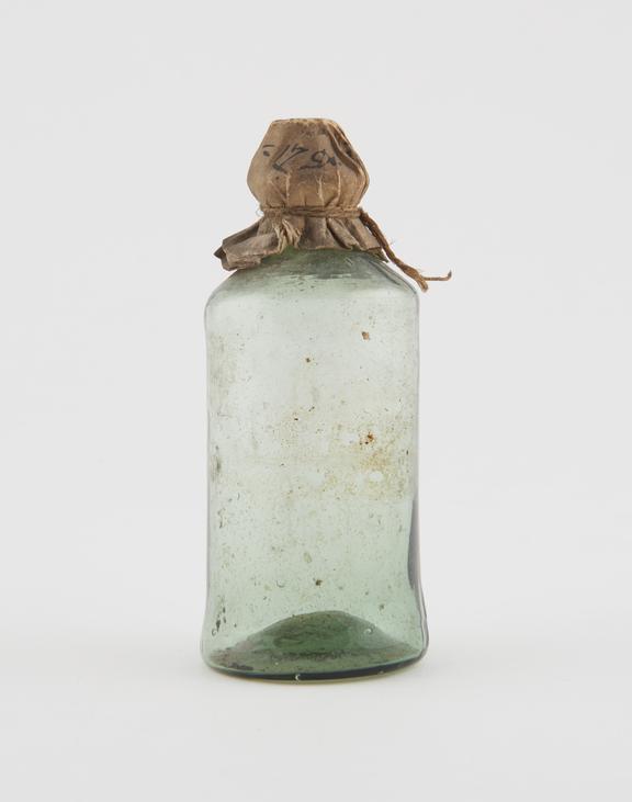 Green glass bottle, cylindrical, pontil mark, hand blown