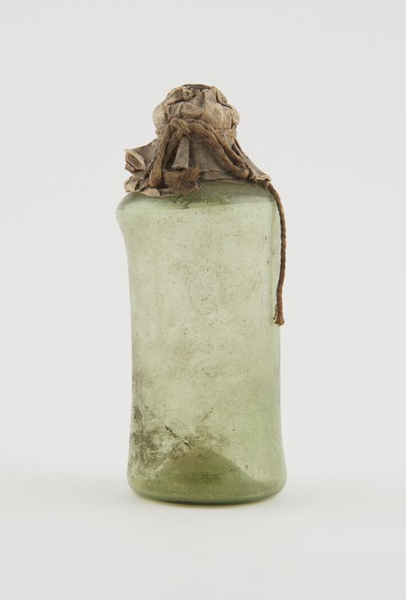 Cylindrical bottle, green glass