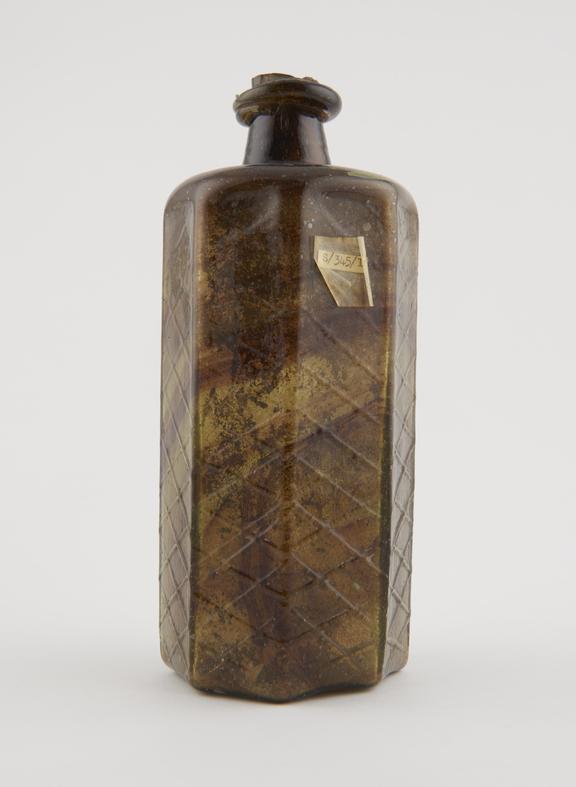 Green glass octagonal bottle, ? English, 19th century