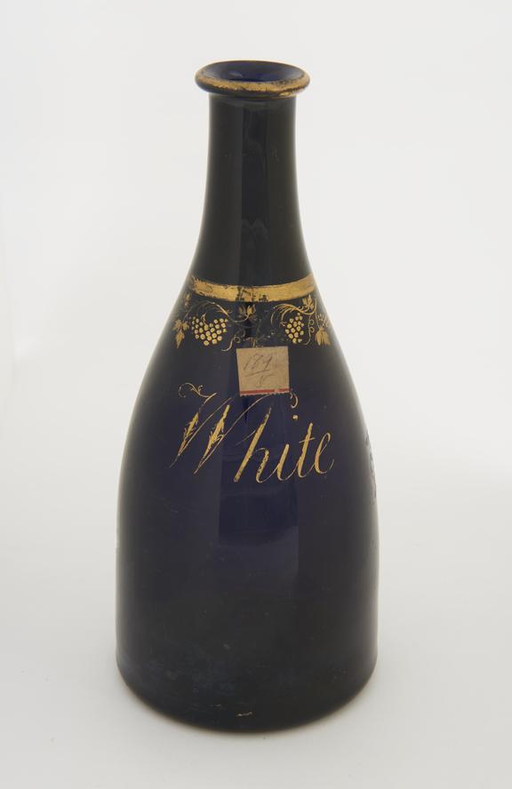 Blue glass decanter, probably for white wine