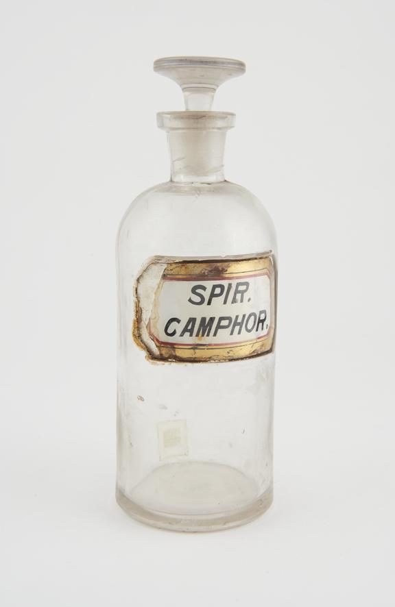 Bottle, clear glass, trace contents, for spirit of camphor, USA