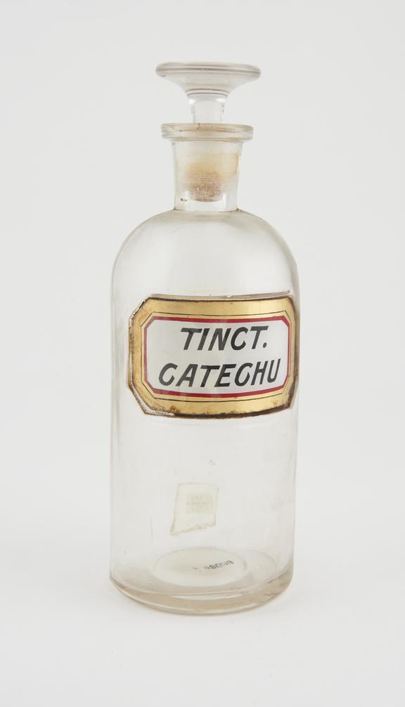 Bottle, clear glass, empty, for tincture of catechu, USA