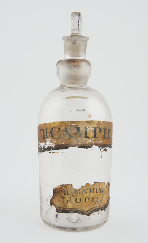 Clear glass poison bottle with glass stopper