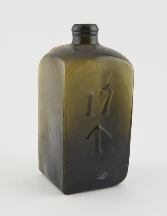 Square storage bottle, green glass, empty, English