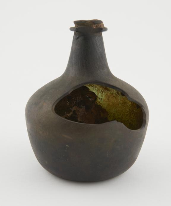 Storage bottle, green glass, empty, unlabelled, English