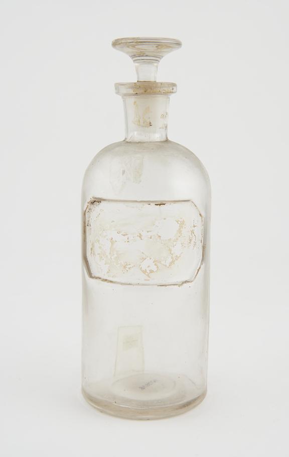 Bottle, clear glass, empty, label missing