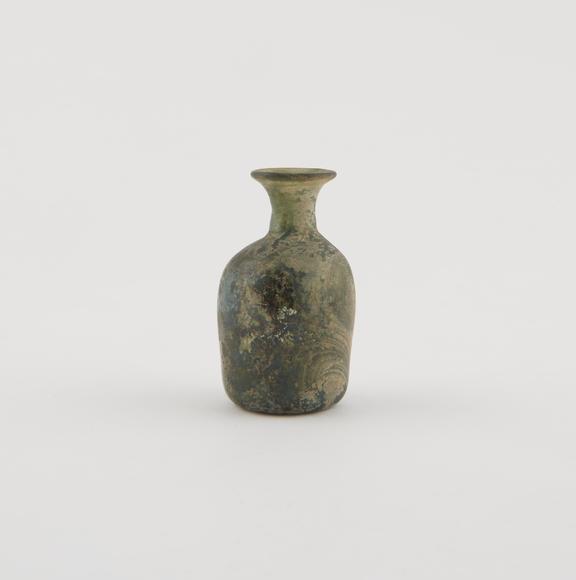 Iridescent green glass bottle, European, 17th-18th centuries