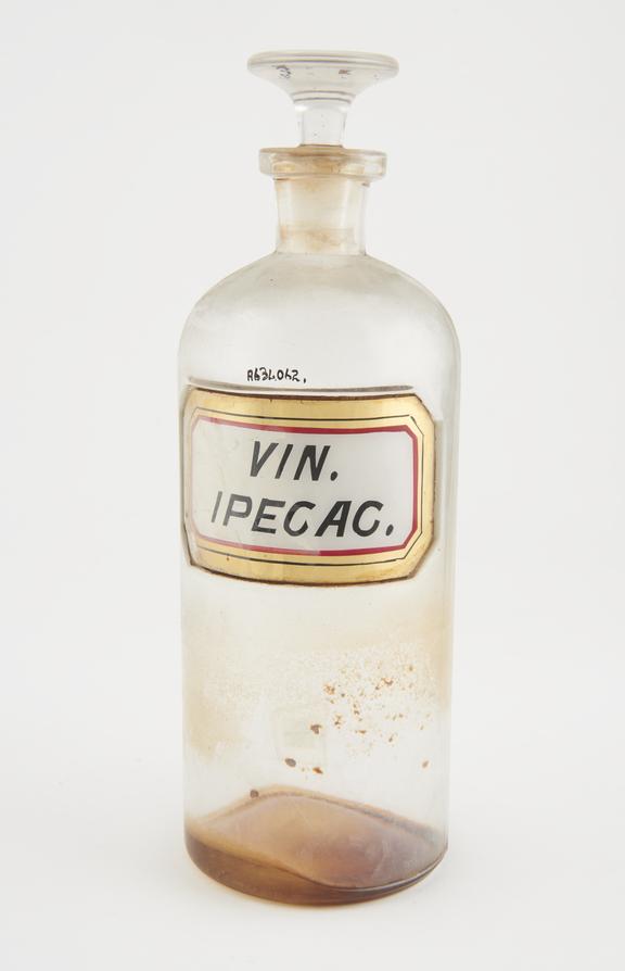 Bottle, clear glass, trace contents, for wine of ipecacuanha