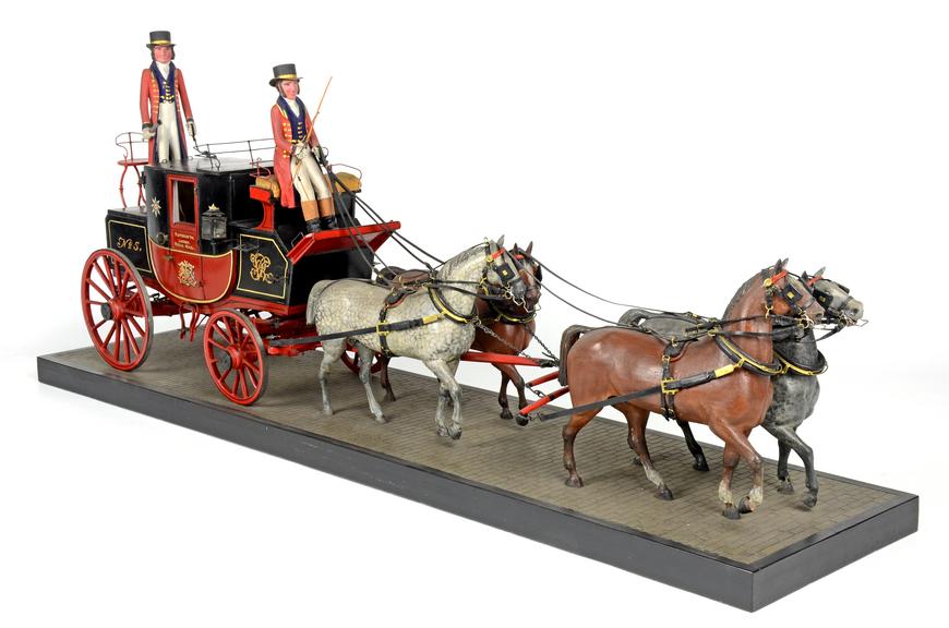 Mail coach with four horses and two figures in the livery of