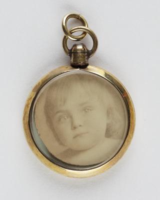 Watch fob containing child's portrait