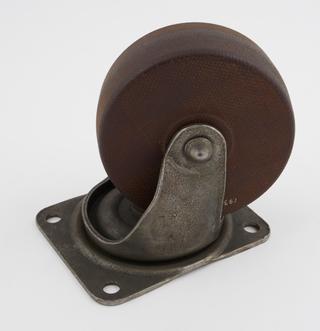 Machine castor with wheel cut from laminated phenolic resinoid bonded sheet