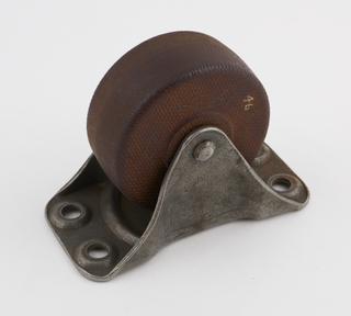 Machine castor with wheel cut from laminated phenolic resinoid bonded sheet