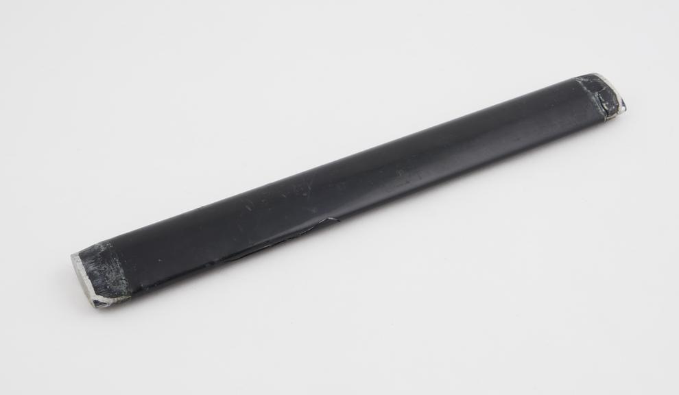 Phenol formaldehyde coated metal rods associated with the board