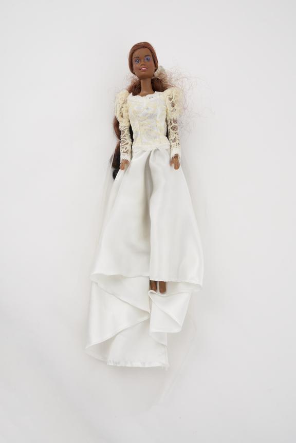 Black Barbie in full wedding dressand full length veil.