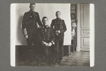 Untitled black and white photograph of three young men