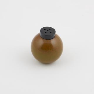 One of two marbled green catalin pepper pots