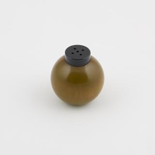 One of two marbled green catalin pepper pots