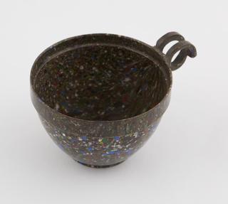 One cup from set of stacking cups and saucers