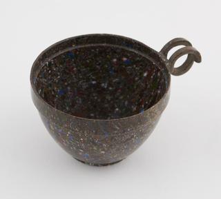 One cup from set of stacking cups and saucers