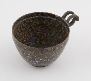 One cup from set of stacking cups and saucers