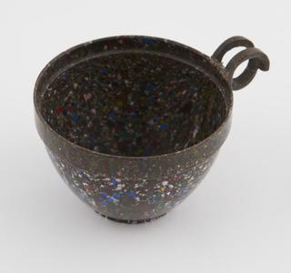 One cup from set of stacking cups and saucers